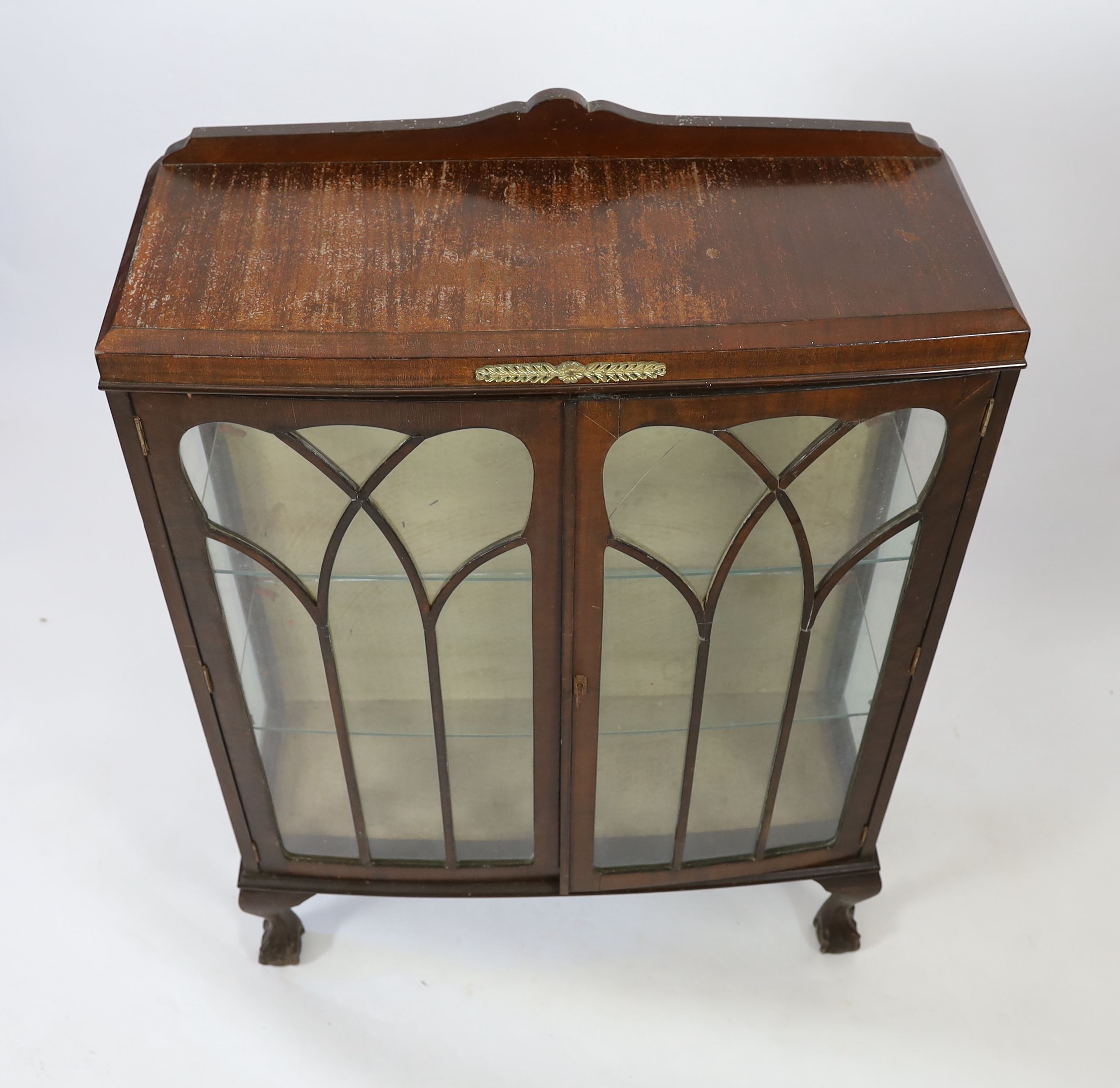A 1920's mahogany bowfront display cabinet, width 88cm depth 32cm height 124cm